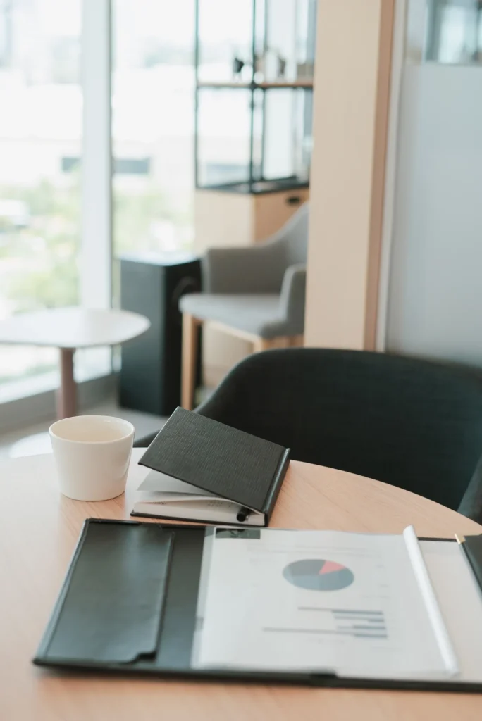 Organized reports and documents on a professional desk