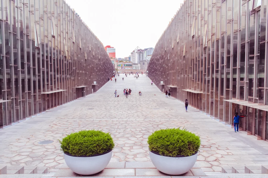 People walking through a contemporary university campus
